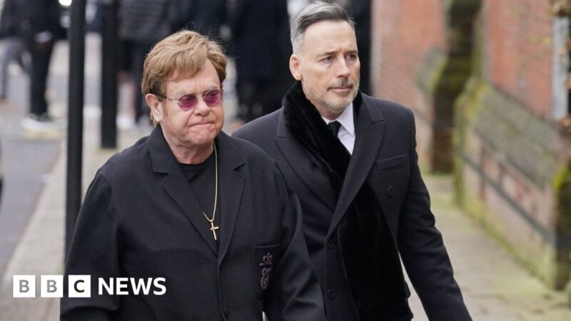 Elton John and Tony Blair at Derek Draper's funeral
